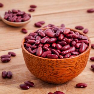 a bowl of freshly harvested red beans